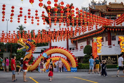 KUALA LUMPUR, MALAYSIA - FEBRUARY 09: People arrive at the Lunar New Year celebration at Thean Hou Temple on February 09, 2024, in Kuala Lumpur, Malaysia. Chinese New Year in Malaysia is marked by family gatherings, festive adornments and traditional rituals embodying a spirit of hope and renewal for the year ahead, and aims to bring joy and prosperity to all while fostering a sense of unity and hope for a successful Year of the Dragon. (Photo by Annice Lyn/Getty Images)