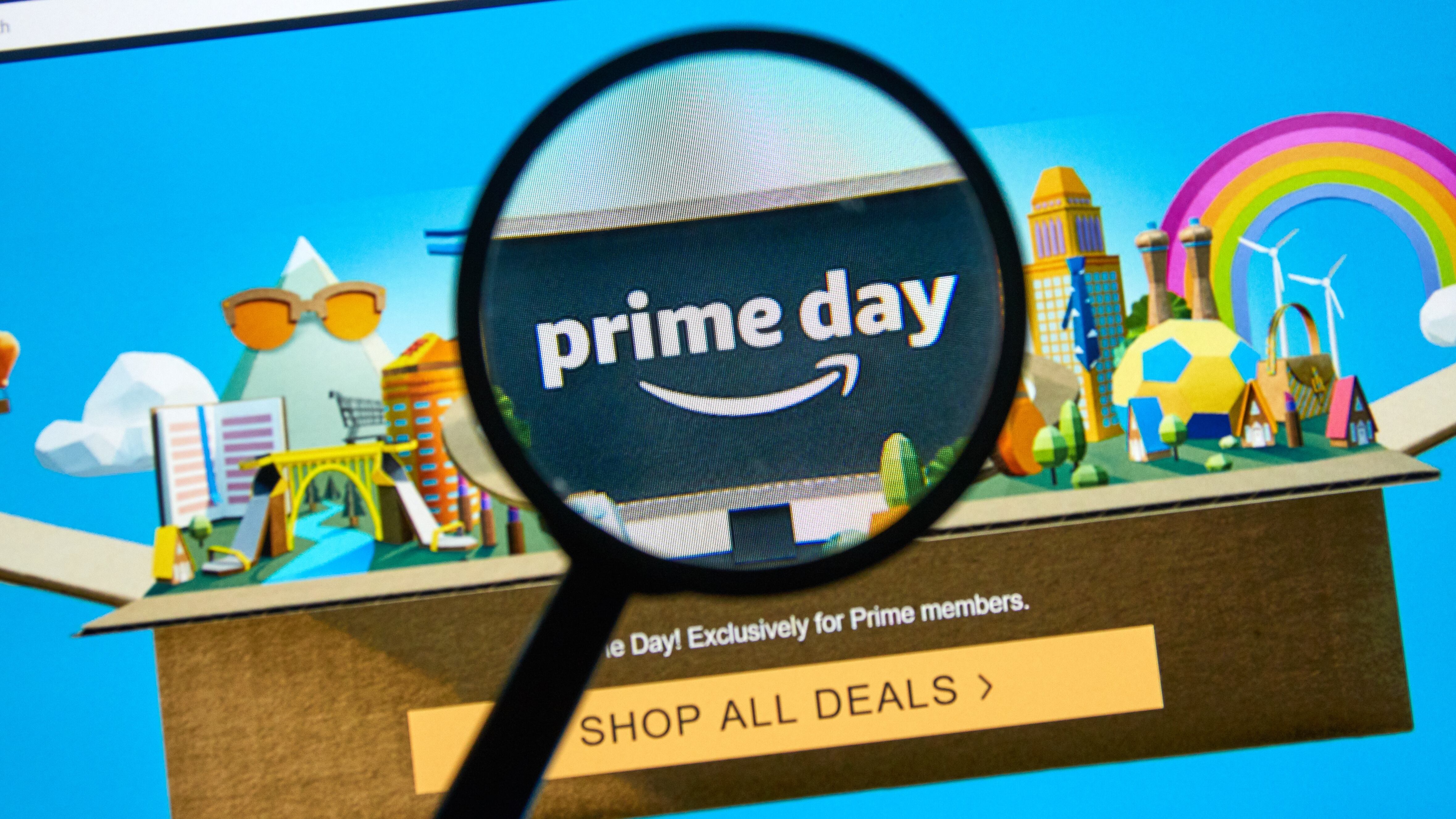 Amazon prime day page on official amazon site under magnifying glass.